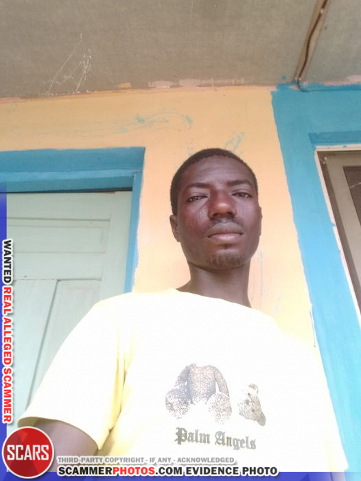 Reported Real Male African Scammer Faces