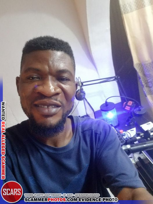 Reported Real Male African Scammer Faces